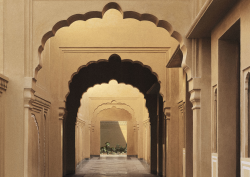 arches leading into The Taj Sawai Man Mahal