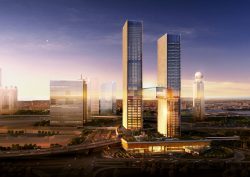 sunset of Dubai skyline, showing new SIRO hotel inside large mixed-use development
